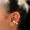 Earcuff dorado, en baño de oro 24k, marca Brazz by Roel