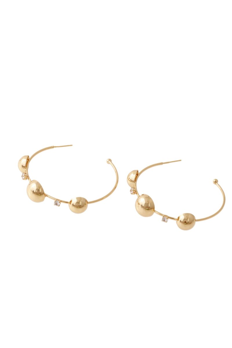 Candonga Dorada Circón, En baño de oro 24k. Marca Brazz By Roel.