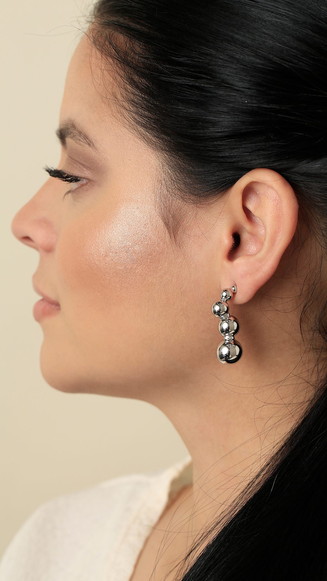 Topo Plateado circular, En baño de oro 24k. Marca Brazz By Roel.