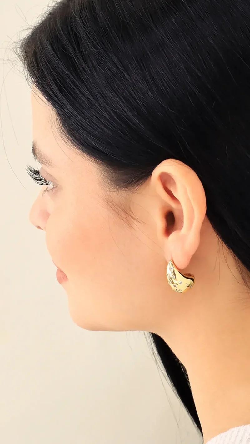 Topo gota dorada, en baño de oro 24k marca Brazz by Roel